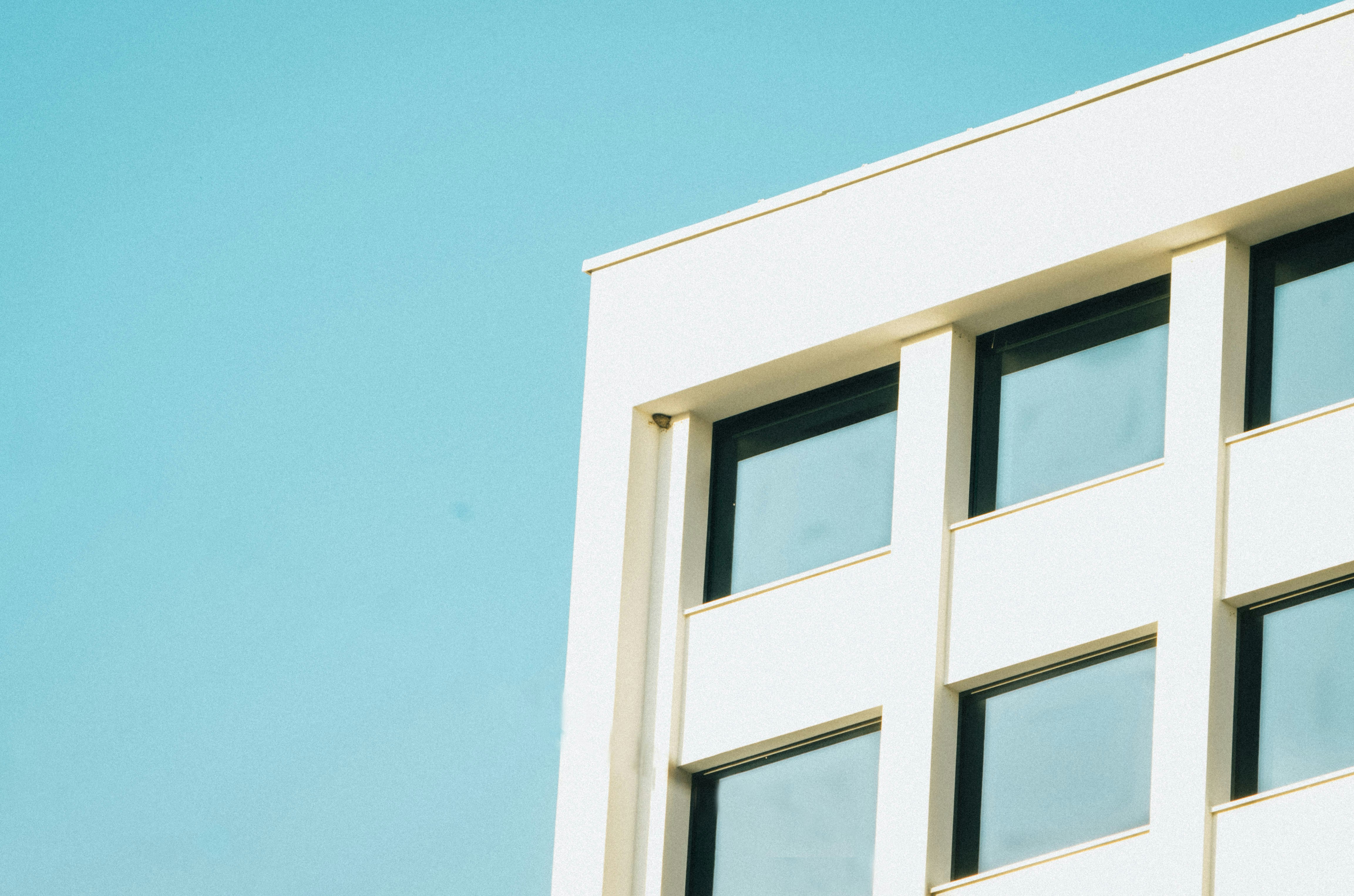 white framed glass window during daytime